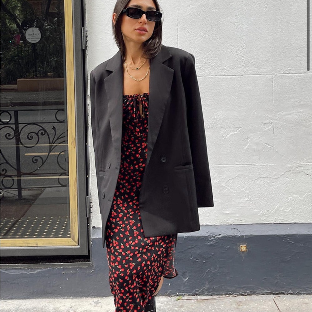 Chic Black Blazer with Red Patterned Dress